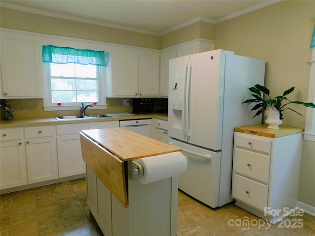 714 Shady Dr, Albemarle, NC 28001 - kitchen featuring white appliances, white cabinetry, wood counters, a center island, and crown molding
