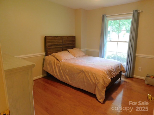 714 Shady Dr, Albemarle, NC 28001 - bedroom featuring wood finished floors and baseboards