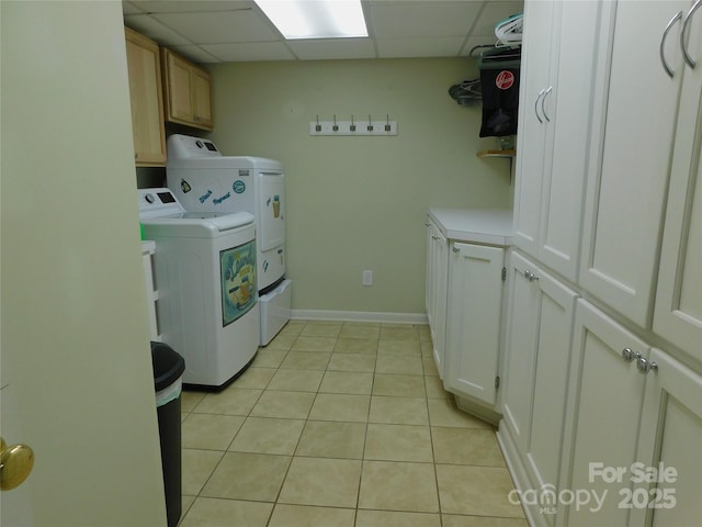 714 Shady Dr, Albemarle, NC 28001 - laundry area featuring independent washer and dryer, cabinet space, and light tile patterned floors