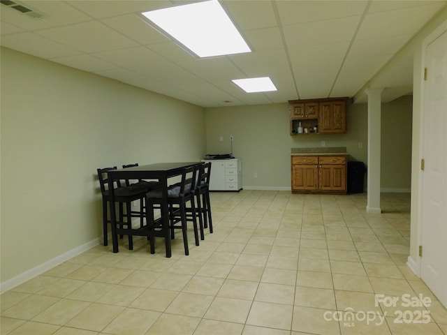 714 Shady Dr, Albemarle, NC 28001 - dining space with baseboards and light tile patterned floors