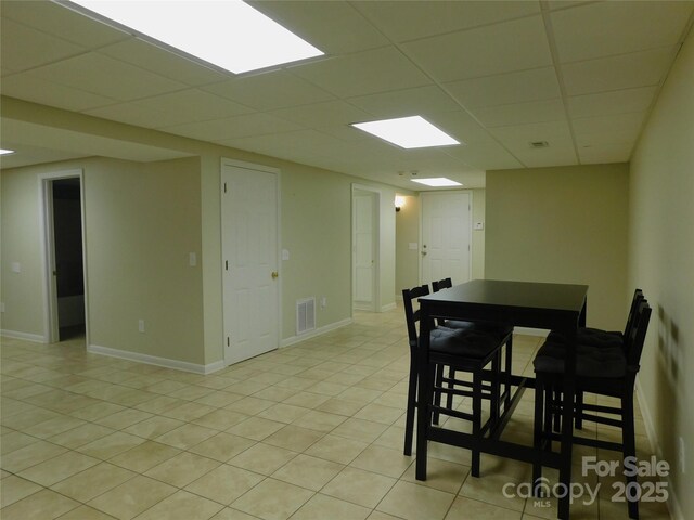 714 Shady Dr, Albemarle, NC 28001 - dining room with a drop ceiling and light tile patterned floors