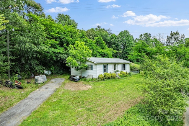 92 Flynn Branch Rd, Asheville, NC 28804 - view of grassy yard with asphalt driveway