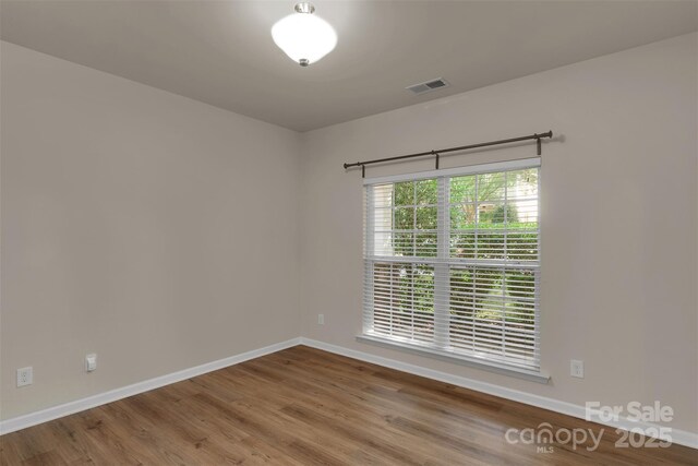 11538 Ardrey Crest Dr, Charlotte, NC 28277 - unfurnished room featuring wood finished floors and baseboards