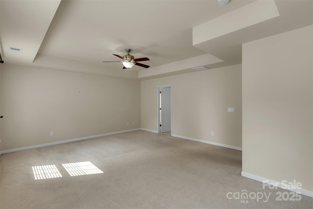 11538 Ardrey Crest Dr, Charlotte, NC 28277 - unfurnished room with a tray ceiling, a ceiling fan, light carpet, and a smoke detector