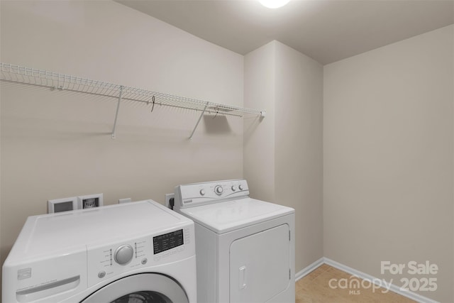 11538 Ardrey Crest Dr, Charlotte, NC 28277 - laundry room with washer and clothes dryer and light tile patterned flooring