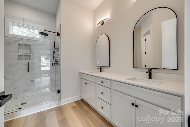 513 Sacco St, Belmont, NC 28012 - full bath featuring double vanity, a marble finish shower, and wood finished floors