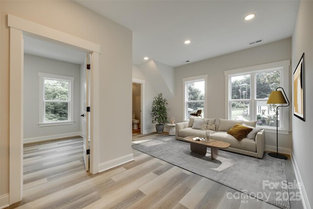 513 Sacco St, Belmont, NC 28012 - living room featuring light wood finished floors and recessed lighting