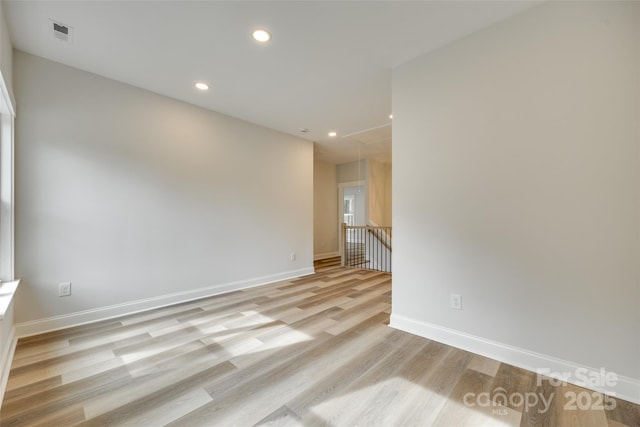 513 Sacco St, Belmont, NC 28012 - unfurnished room featuring attic access, light wood-style floors, and recessed lighting