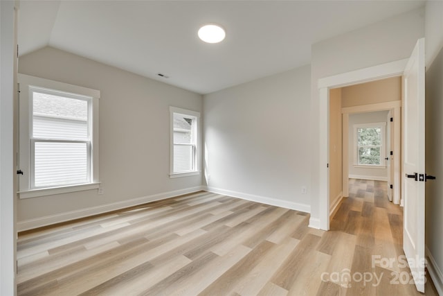 513 Sacco St, Belmont, NC 28012 - unfurnished room featuring light wood-type flooring and vaulted ceiling