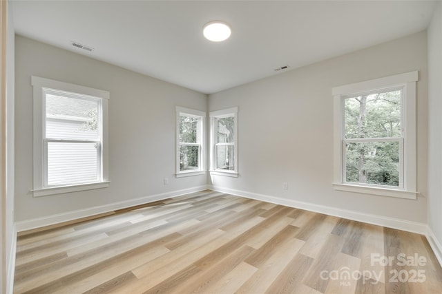 513 Sacco St, Belmont, NC 28012 - empty room featuring light wood-style flooring and baseboards