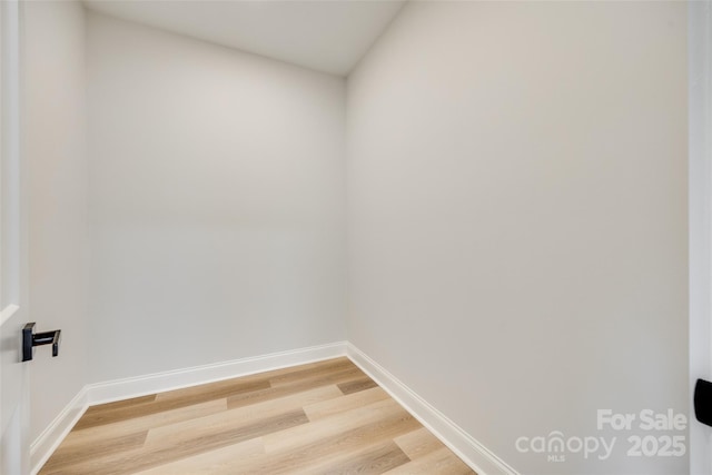 513 Sacco St, Belmont, NC 28012 - empty room with light wood finished floors and baseboards