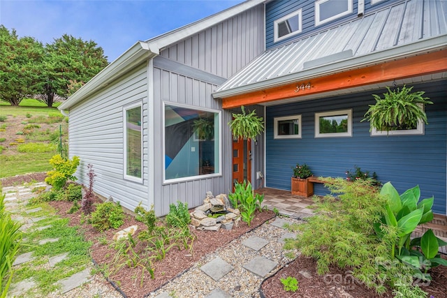 344 Hemlock Springs Trl, Weaverville, NC 28787 - entrance to property with board and batten siding and a metal roof