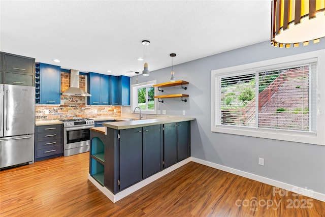 344 Hemlock Springs Trl, Weaverville, NC 28787 - kitchen featuring stainless steel appliances, open shelves, wall chimney exhaust hood, a peninsula, and recessed lighting