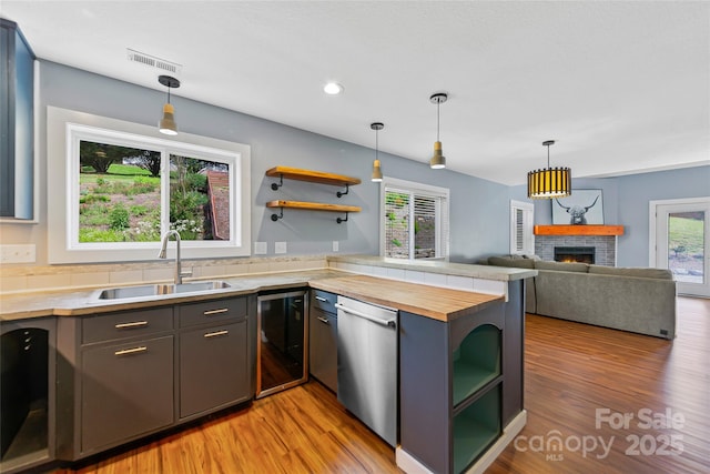 344 Hemlock Springs Trl, Weaverville, NC 28787 - kitchen featuring open shelves, butcher block countertops, dishwasher, a peninsula, and recessed lighting