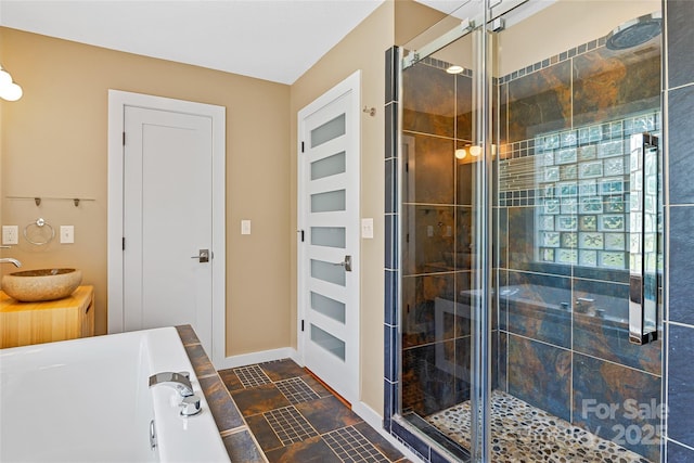 344 Hemlock Springs Trl, Weaverville, NC 28787 - bathroom featuring a stall shower, a garden tub, stone finish floors, and vanity