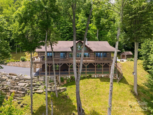 242 Anisidi Trl, Maggie Valley, NC 28751 - rear view of house with stairway, a wooden deck, and a yard
