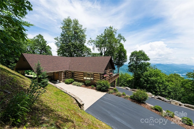 242 Anisidi Trl, Maggie Valley, NC 28751 - cabin featuring driveway, roof with shingles, and log siding
