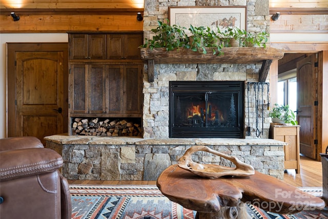 242 Anisidi Trl, Maggie Valley, NC 28751 - interior space with wood finished floors and a fireplace
