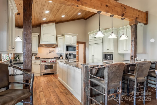 242 Anisidi Trl, Maggie Valley, NC 28751 - kitchen with stainless steel appliances, a wooden ceiling with exposed beams, custom exhaust hood, light wood-style floors, and stone countertops