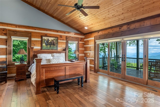 242 Anisidi Trl, Maggie Valley, NC 28751 - bedroom featuring vaulted ceiling, access to outside, hardwood / wood-style flooring, multiple windows, and wood ceiling