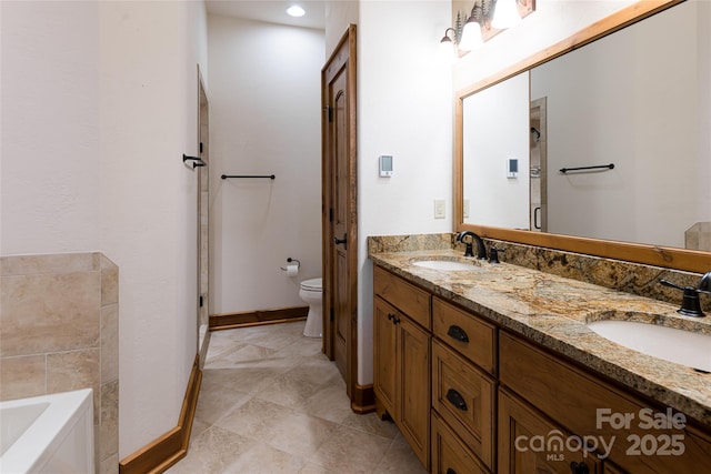 242 Anisidi Trl, Maggie Valley, NC 28751 - bathroom featuring double vanity and a garden tub