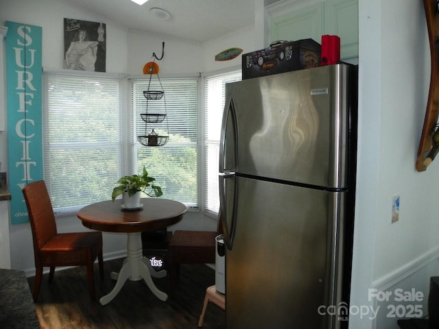 166 Eagle Dr, New London, NC 28127 - kitchen featuring freestanding refrigerator, dark wood-style floors, and lofted ceiling
