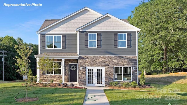 780 14th Avenue Ct NE, Hickory, NC 28601 - craftsman-style home with french doors, stone siding, and a front yard