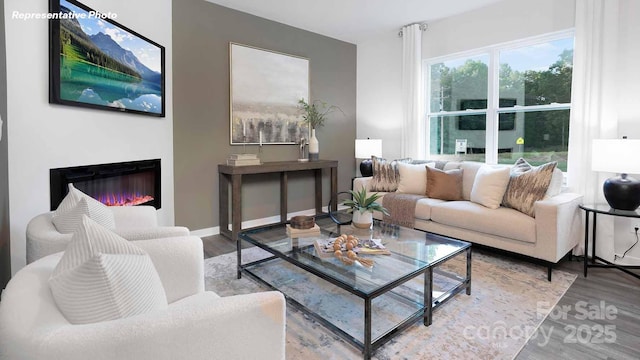 780 14th Avenue Ct NE, Hickory, NC 28601 - living room with a glass covered fireplace and wood finished floors