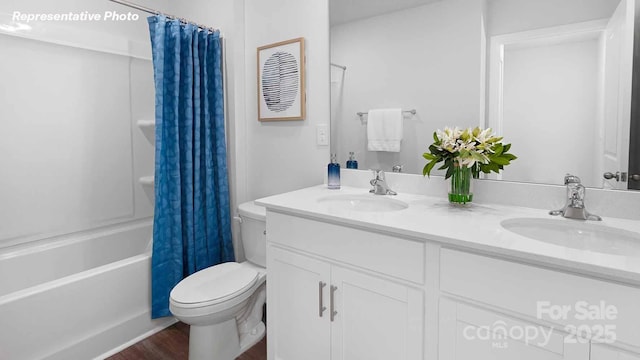 780 14th Avenue Ct NE, Hickory, NC 28601 - bathroom with double vanity, shower / tub combo, and wood finished floors