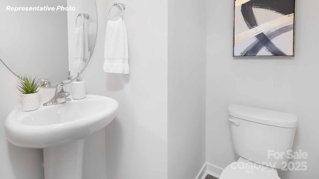 780 14th Avenue Ct NE, Hickory, NC 28601 - bathroom with toilet and a sink