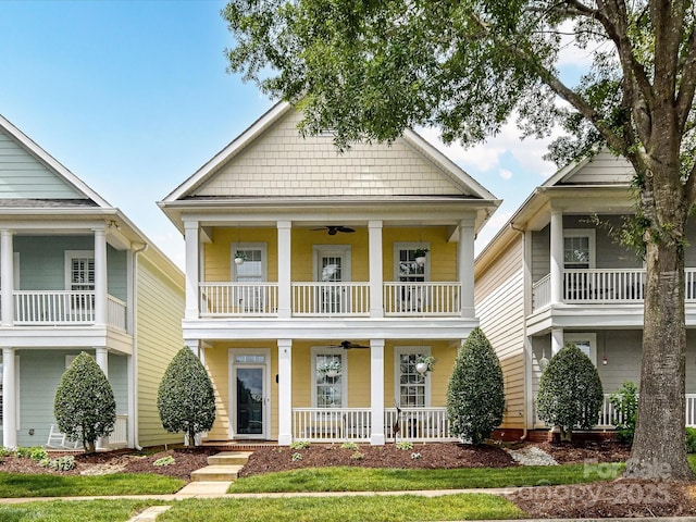 2003 Trigger Dr, Indian Trail, NC 28079 - view of front of house with covered porch, ceiling fan, and a balcony