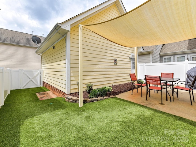 2003 Trigger Dr, Indian Trail, NC 28079 - fenced backyard featuring a patio and a gate