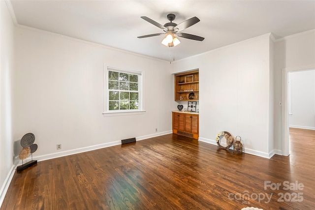 302 White St, Morganton, NC 28655 - unfurnished room featuring crown molding, a ceiling fan, and dark wood-style flooring