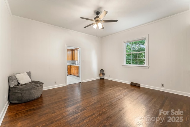302 White St, Morganton, NC 28655 - spare room featuring ceiling fan, ornamental molding, and dark wood-style flooring