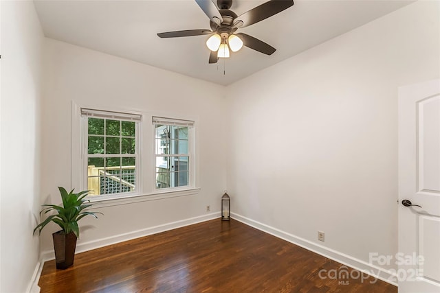 302 White St, Morganton, NC 28655 - spare room featuring dark wood-style floors and ceiling fan