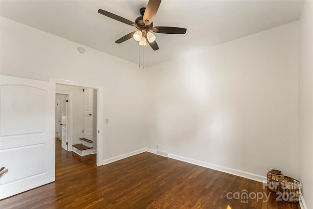 302 White St, Morganton, NC 28655 - empty room with dark wood finished floors and a ceiling fan