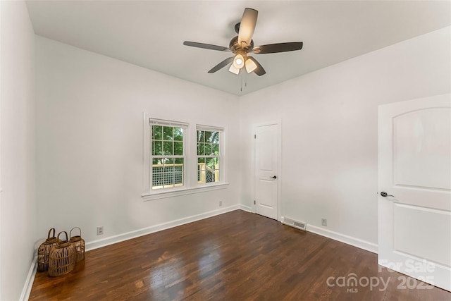 302 White St, Morganton, NC 28655 - unfurnished room with dark wood-style flooring and a ceiling fan