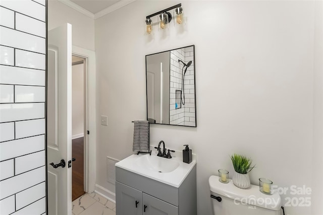 302 White St, Morganton, NC 28655 - bathroom featuring crown molding, marble finish floors, and vanity