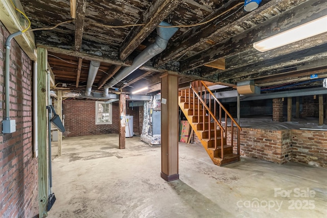 302 White St, Morganton, NC 28655 - unfinished below grade area featuring stairway and brick wall