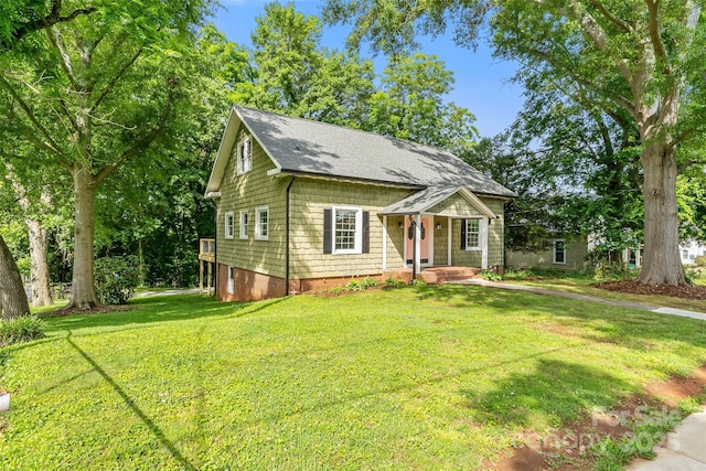 302 White St, Morganton, NC 28655 - view of front of home featuring a front lawn and a shingled roof