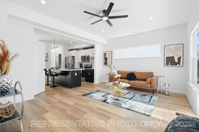 213 Knot St, Shelby, NC 28150 - living room featuring ceiling fan, light wood-style flooring, and recessed lighting