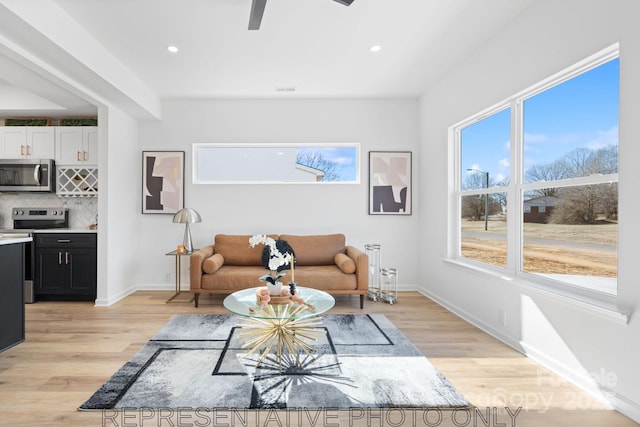 213 Knot St, Shelby, NC 28150 - living room featuring light wood-style flooring, recessed lighting, and a ceiling fan