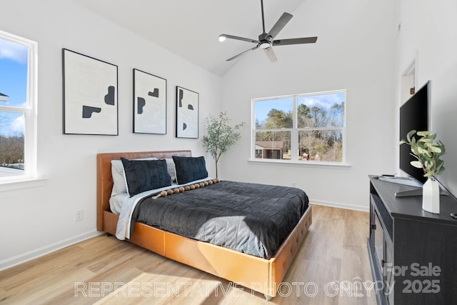 213 Knot St, Shelby, NC 28150 - bedroom featuring wood finished floors, high vaulted ceiling, and a ceiling fan
