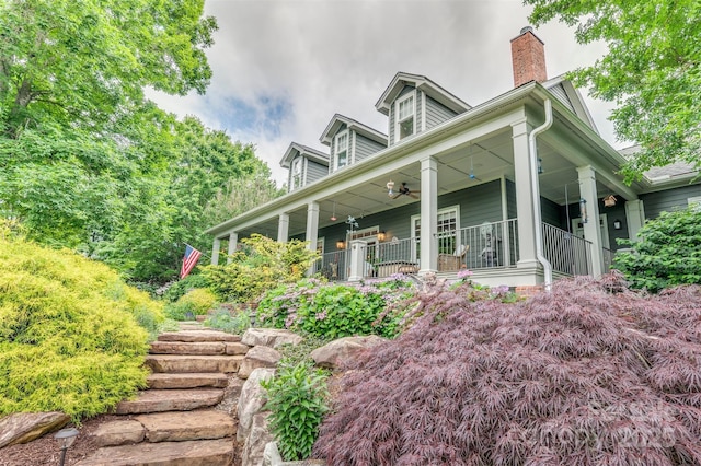 94 Spruce Hill Dr, Hendersonville, NC 28792 - view of front of home with covered porch, a chimney, and a ceiling fan
