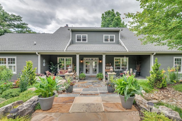 94 Spruce Hill Dr, Hendersonville, NC 28792 - back of property with french doors, roof with shingles, and a patio area