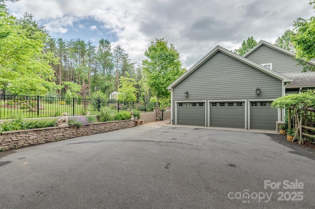 94 Spruce Hill Dr, Hendersonville, NC 28792 - view of home's exterior featuring driveway and an attached garage