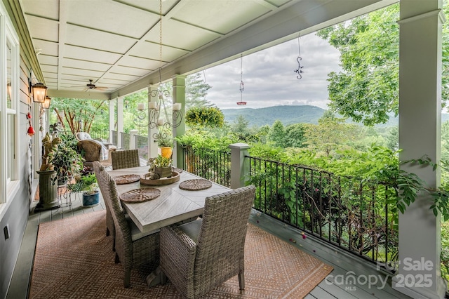 94 Spruce Hill Dr, Hendersonville, NC 28792 - view of patio featuring a ceiling fan, outdoor dining space, and a mountain view