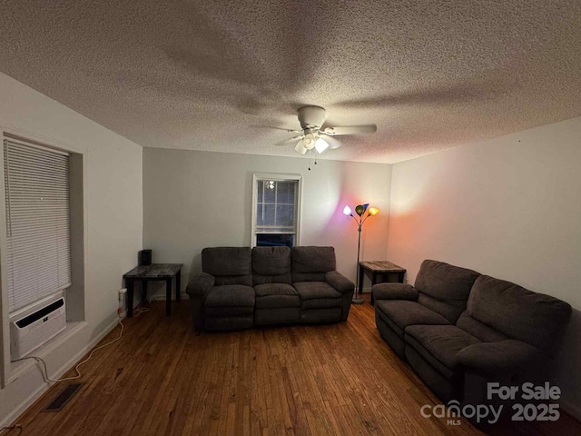 128 Pine St, Shelby, NC 28152 - living area featuring hardwood / wood-style floors, a ceiling fan, and a textured ceiling