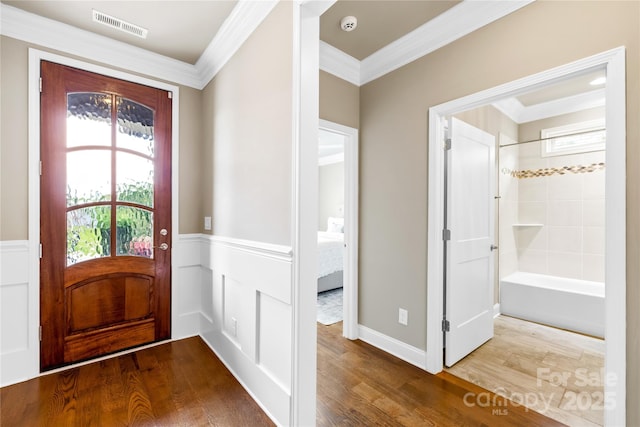 6107 Gold Springs Way, Denver, NC 28037 - entrance foyer featuring crown molding, wood finished floors, and wainscoting