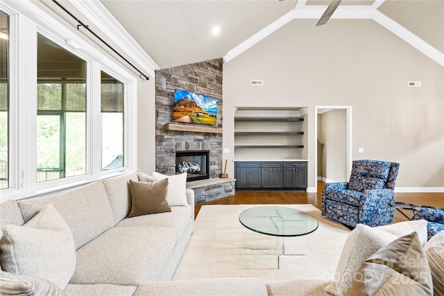 6107 Gold Springs Way, Denver, NC 28037 - living room featuring wood finished floors, a stone fireplace, and high vaulted ceiling